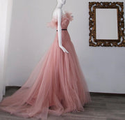 Enticing sweetheart neckline strapless gown.
